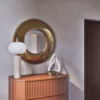 Encanto - Specchio rotondo in acciaio dorato Ø 90 cm